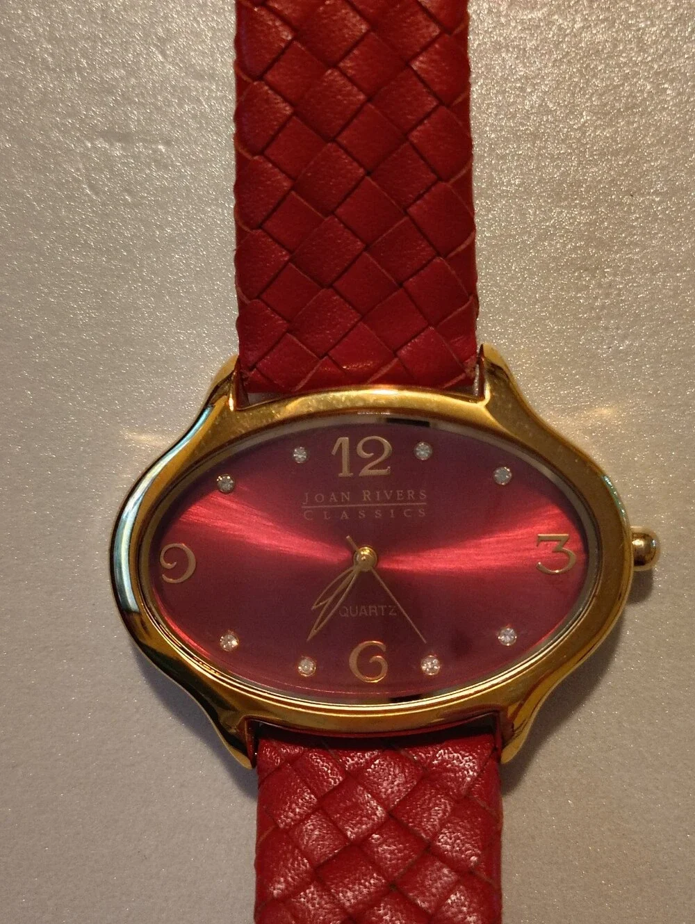 Joan Rivers gold tone